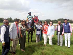 Dream Alliance (Anthony Raj up), winner of JSK1 Best Odds Eve Champion Trophy being led in by the winning connections at Pune on Sunday.